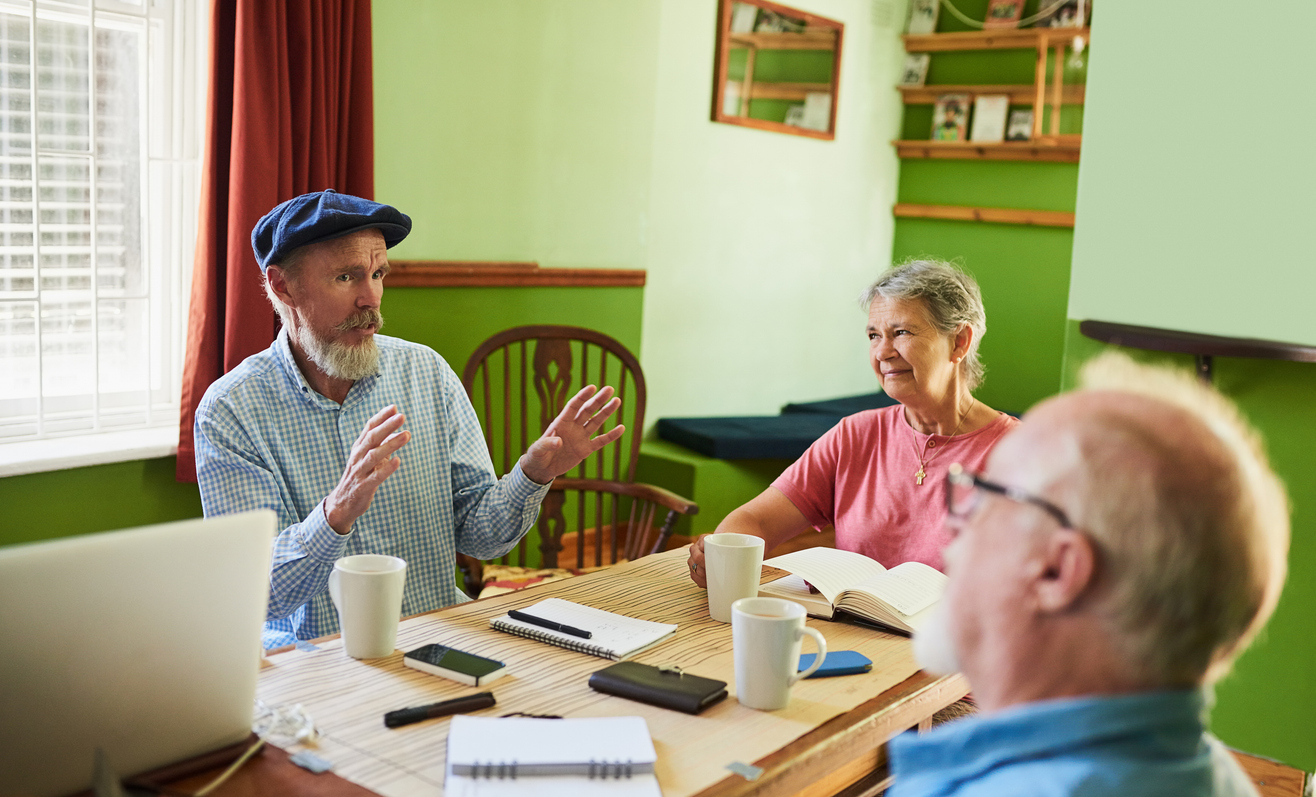 Farm family talking at a table