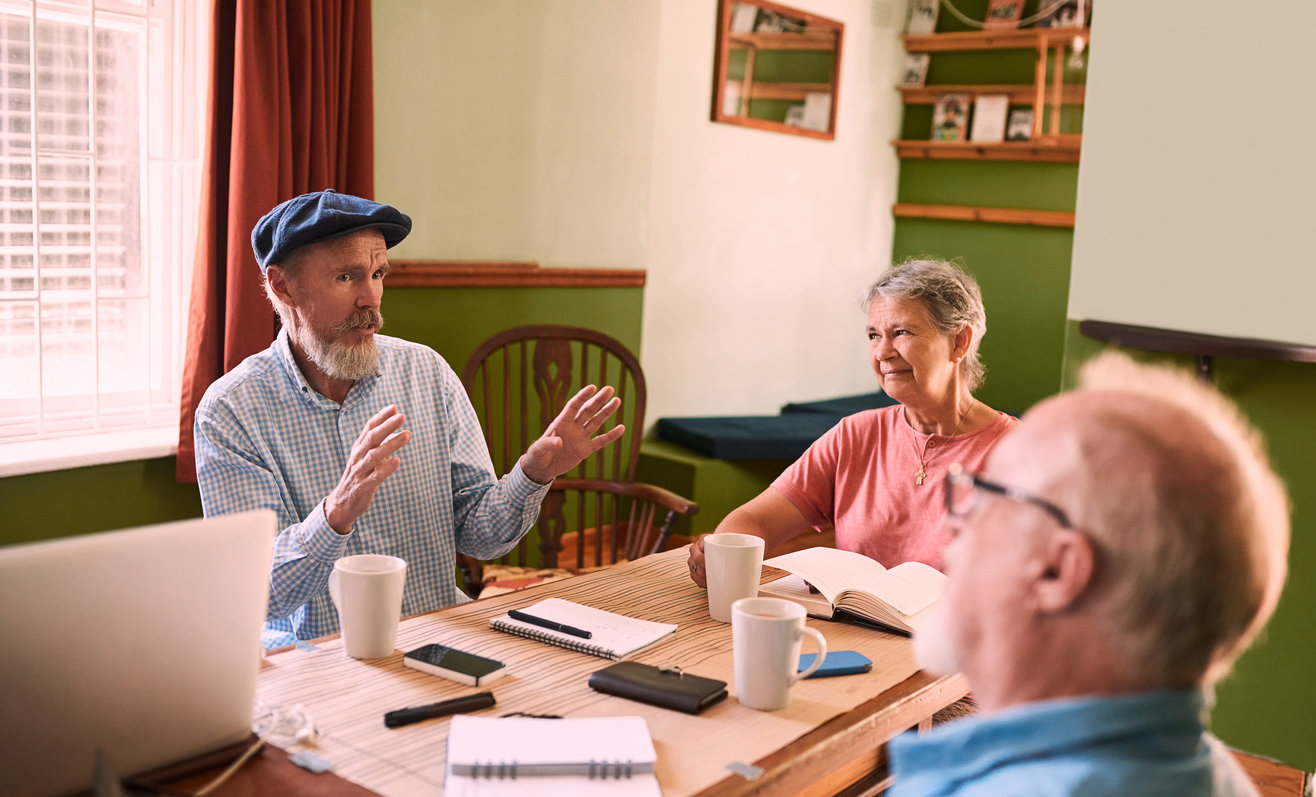 Farm family talking at a table